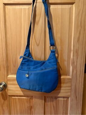 Travelon Anti-Theft Classic Crossbody Bag in a vibrant blue NWOT
